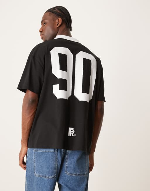 ASOS DESIGN oversized polo with sports graphic in black