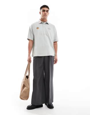 Asos Design Oversized Polo With Text Graphic In Gray