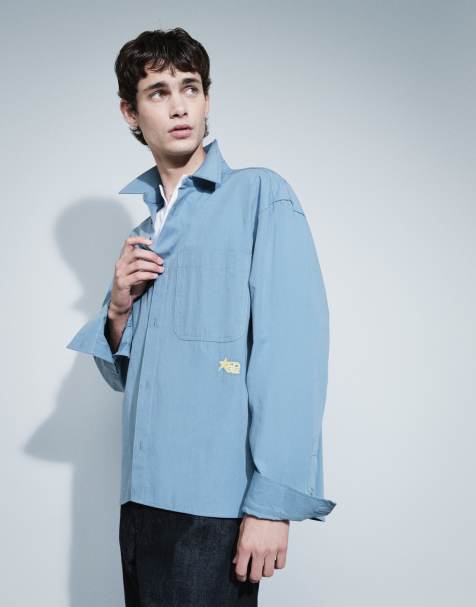 ASOS DESIGN oversized poplin-skjorte med brystbroderi i blå - view 1
