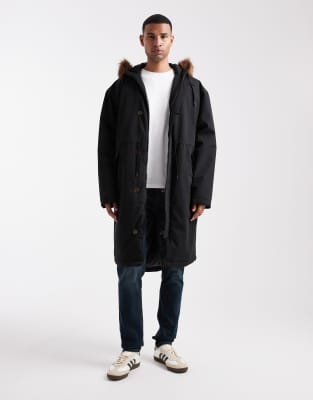 Asos Design Oversized Puffer Jacket With Faux Fur Hood In Black