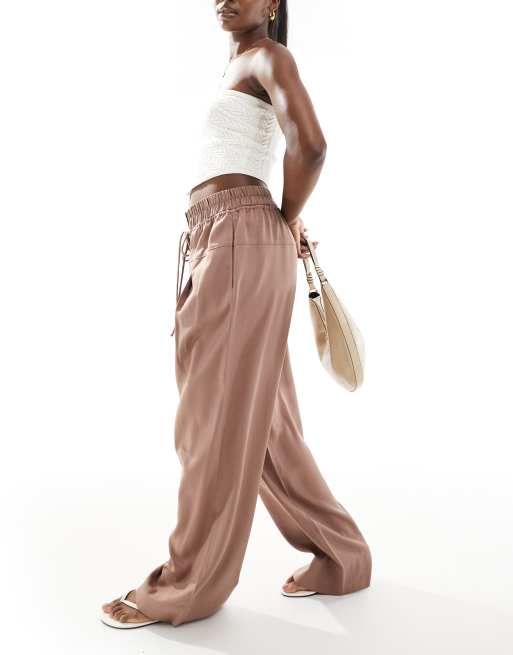 ASOS DESIGN oversized pull on pants with panel and pleat details in mocha