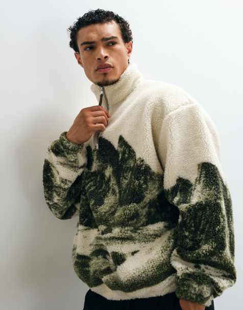 ASOS DESIGN oversized quarter zip borg sweatshirt with mountain print in green - view 1