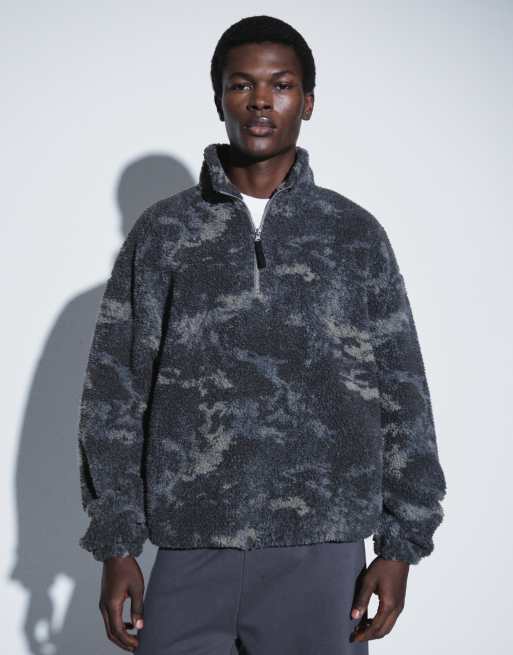 ASOS DESIGN oversized quarter zip borg with camo print in black, 2 of 9