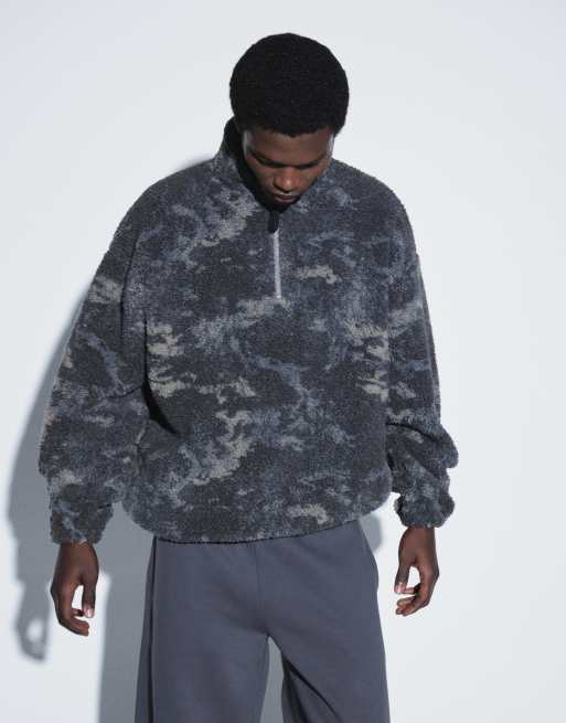 ASOS DESIGN oversized quarter zip borg with camo print in black, 3 of 9