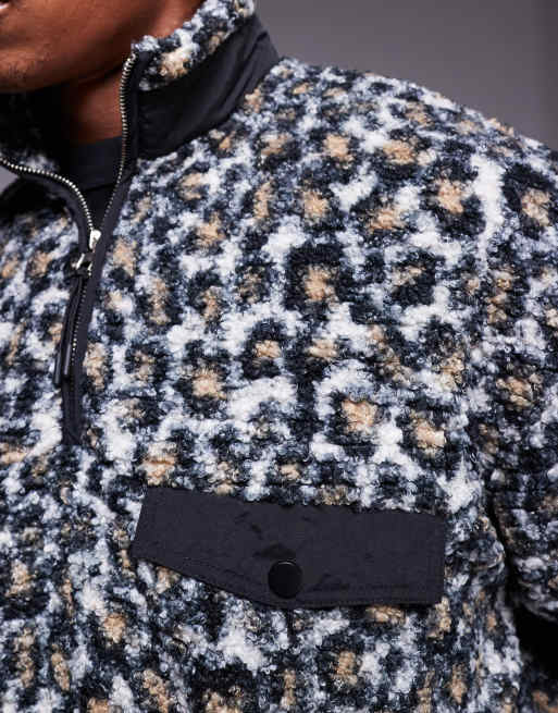ASOS DESIGN oversized quarter zip sweatshirt in borg leopard print