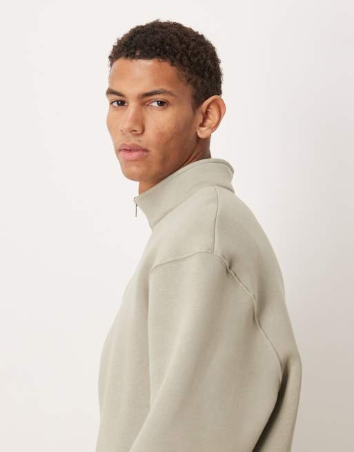 ASOS DESIGN oversized quarter zip sweatshirt with internal plaid in khaki green, 4 of 5