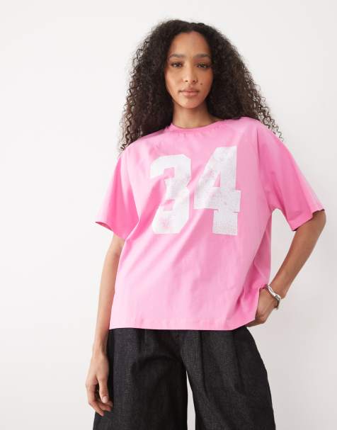 ASOS DESIGN oversized raglan football t-shirt with 34 varsity graphic in light pink - view 1