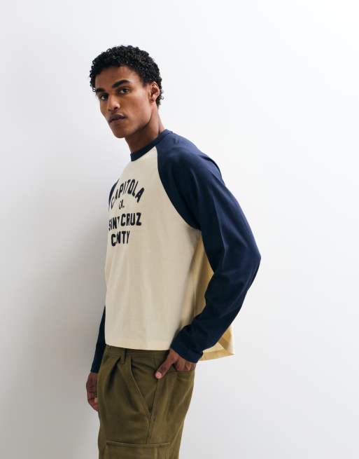 ASOS DESIGN oversized raglan long sleeve t-shirt with text print and curved hem in cream and navy, 4 of 5