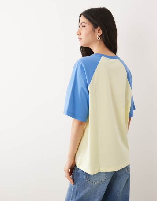 ASOS DESIGN oversized raglan sleeve T-shirt with embroidered Paris soccer graphic in yellow and light blue, 4 of 4