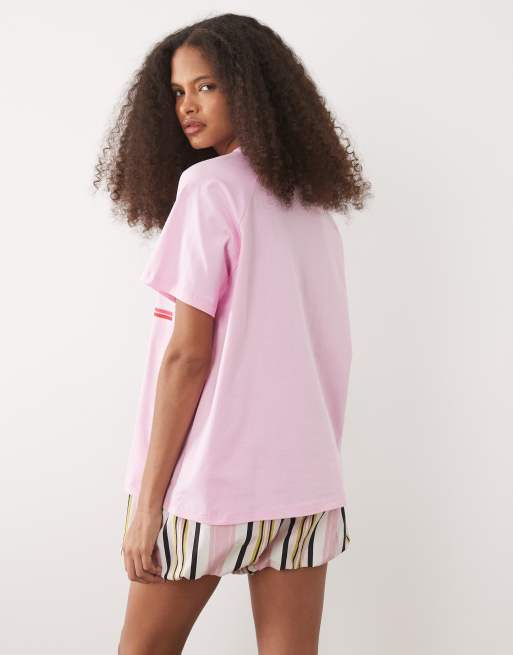 ASOS DESIGN oversized raglan sleeve t-shirt with Palm Springs sports graphic in pink, 2 of 4
