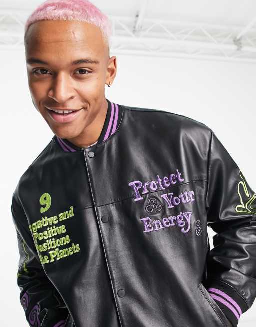 ASOS DESIGN oversized varsity bomber jacket in black with purple badging