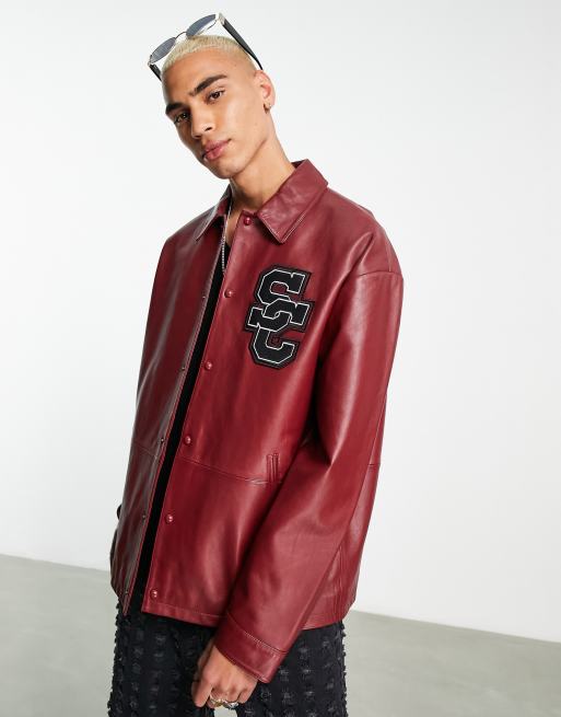 ASOS DESIGN oversized real varsity leather bomber jacket in black