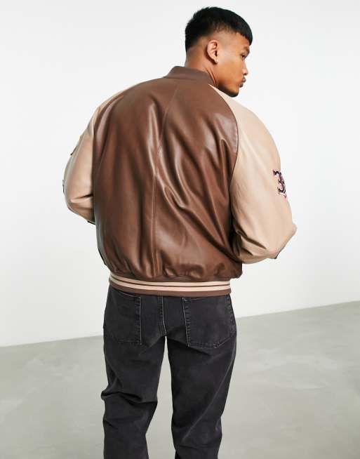 ASOS DESIGN faux leather varsity jacket with embroidery in brown