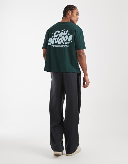 ASOS DESIGN - Oversized recht T-shirt met grafische 'studios'-print in donkergroen, 2 van 5