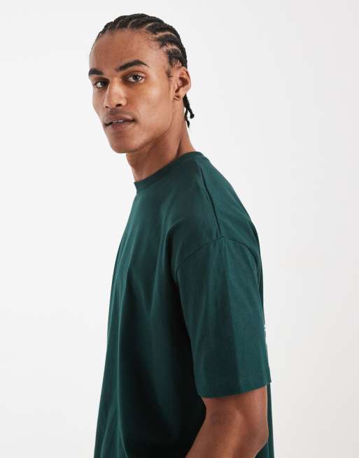 ASOS DESIGN - Oversized recht T-shirt met grafische 'studios'-print in donkergroen, 4 van 5