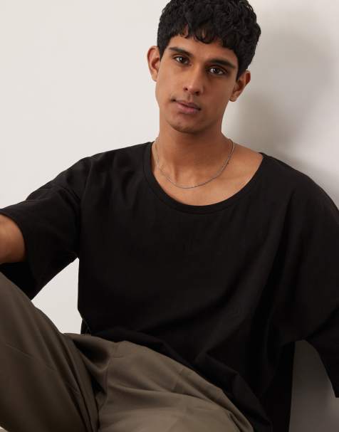 ASOS DESIGN - Oversized recht T-shirt met lage ronde hals en verlaagde schouders in zwart - view 1