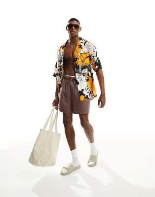 ASOS DESIGN oversized revere longline bowling shirt in 70s floral