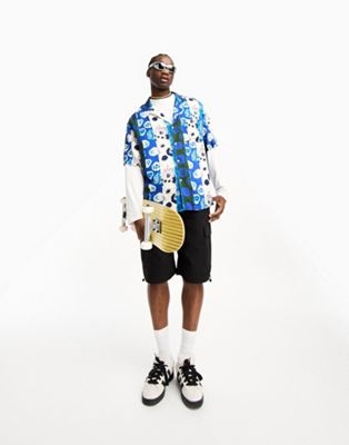 ASOS DESIGN oversized revere longline bowling shirt in blue floral photographic patchwork print - ASOS Price Checker