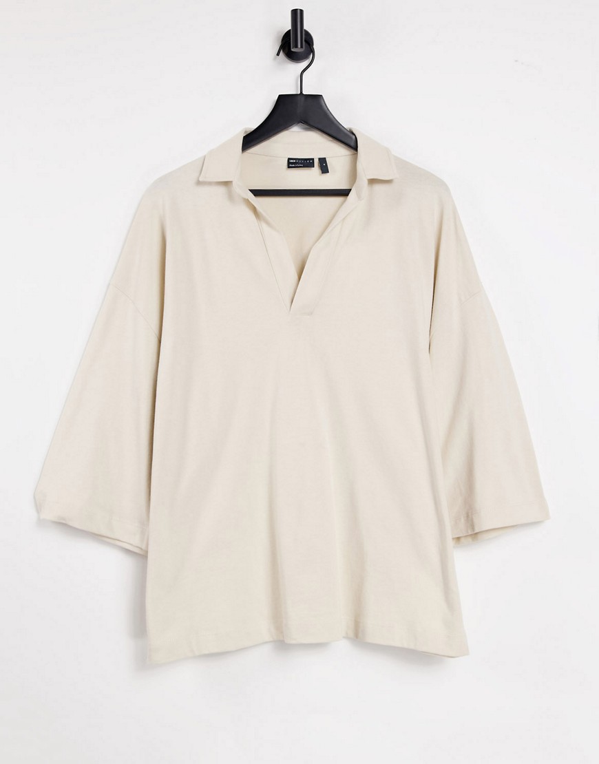 ASOS DESIGN oversized revere polo top with half sleeve in beige-Neutral