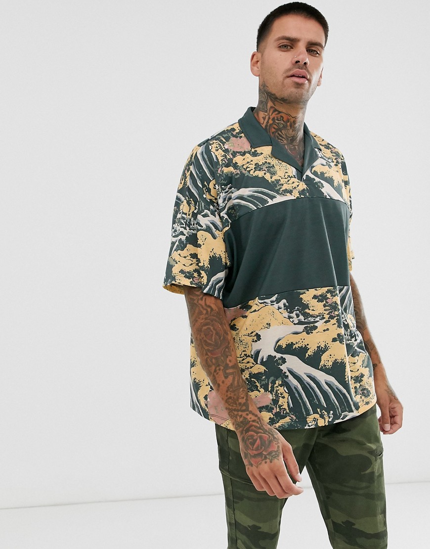 ASOS DESIGN oversized revere polo with all over print and colour block-Green