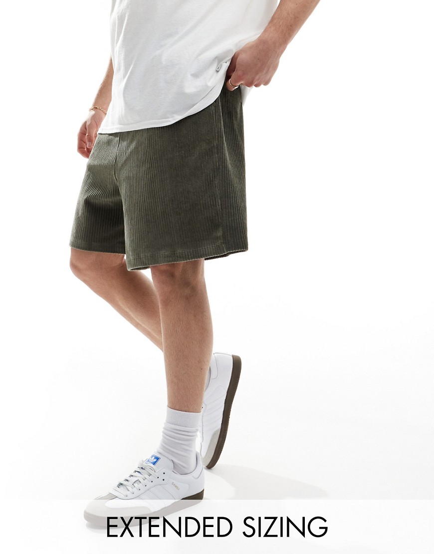 ASOS DESIGN oversized ribbed velour shorts in dark green