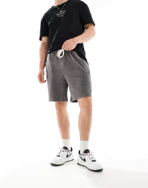 ASOS DESIGN oversized ribbed velour shorts in grey - view 1