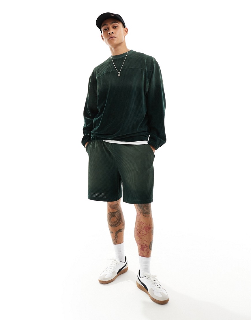 ASOS DESIGN oversized ribbed velour shorts in washed dark green