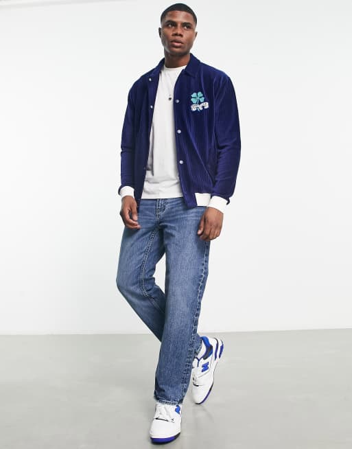 ASOS DESIGN oversized varsity jacket in navy