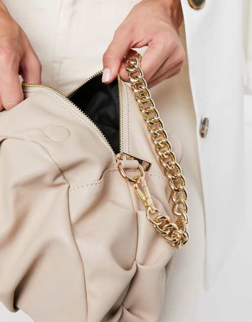 Beige designer outlet clutch