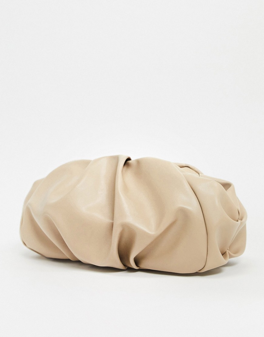 ASOS DESIGN oversized ruched clutch bag in beige-Cream