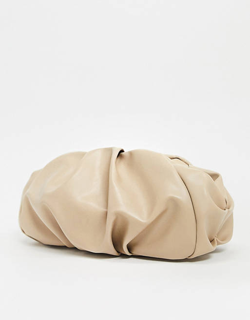 ASOS DESIGN oversized ruched clutch bag in beige