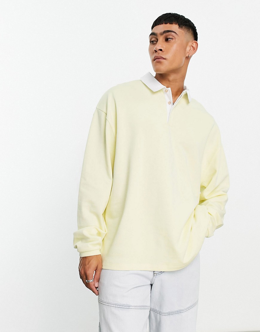 ASOS DESIGN oversized rugby polo sweatshirt in washed yellow