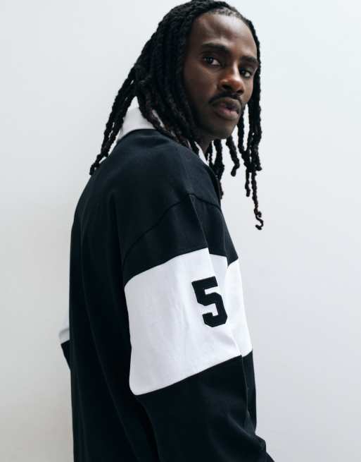 ASOS DESIGN oversized rugby polo with Guinness print in Black, 5 of 5