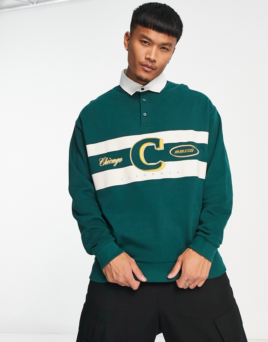 ASOS DESIGN oversized rugby sweatshirt in green with text print