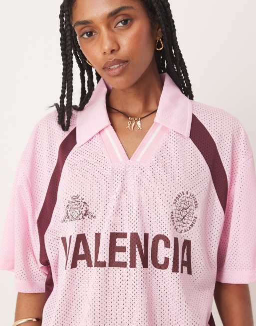 ASOS DESIGN oversized rugby t-shirt with valencia graphic in pink