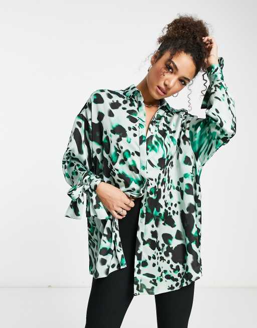 ASOS DESIGN leopard longline blouse with button front in multi