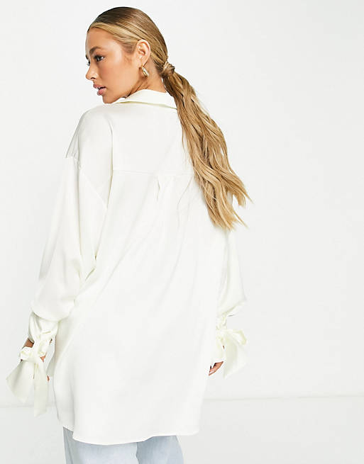  Shirts & Blouses/oversized satin shirt with tie cuff detail in cream 