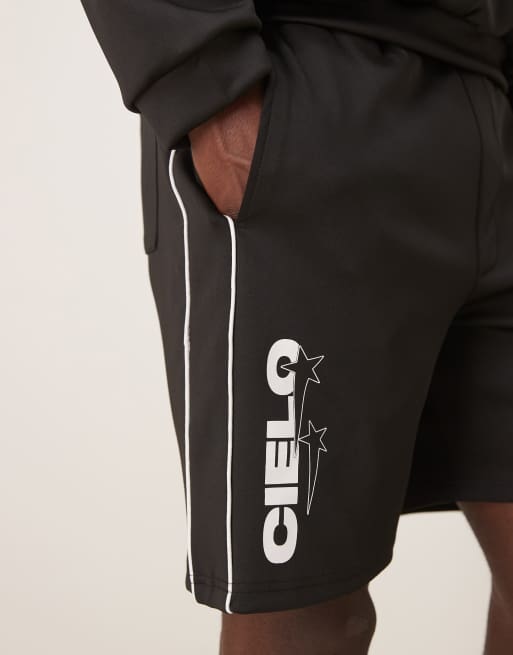 ASOS DESIGN oversized scuba-style fabric shorts with print in black co ord, 3 of 5