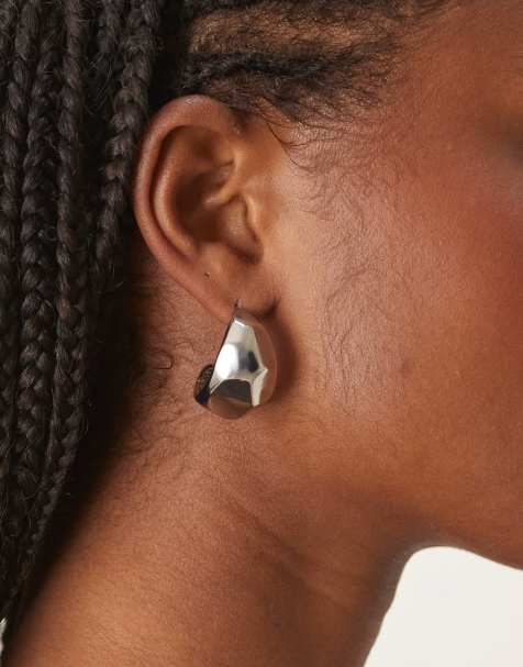 ASOS DESIGN oversized sculptural stud earrings in silver tone - view 1