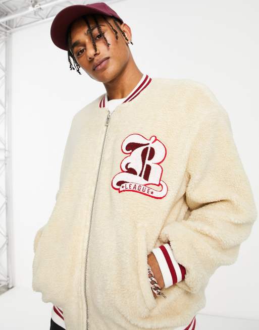 ASOS DESIGN oversized varsity jersey jacket in sherpa with badging