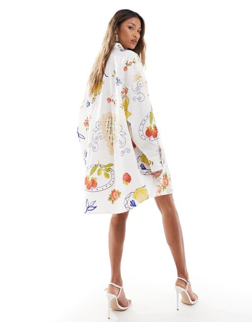 ASOS DESIGN oversized shirt dress with dropped pockets in postcard print ASOS