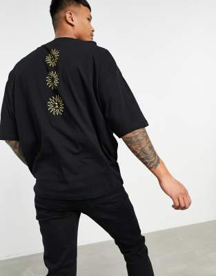 ASOS DESIGN oversized T-shirt in black with photographic spine