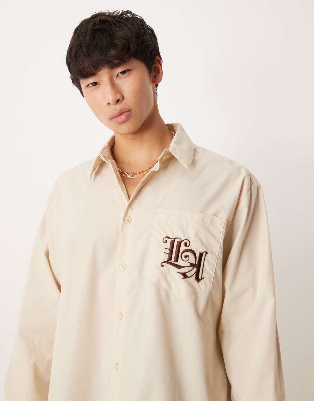 ASOS DESIGN oversized shirt with chest embroidery in beige