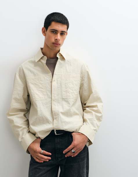 ASOS DESIGN oversized shirt with double pockets in cream - view 1