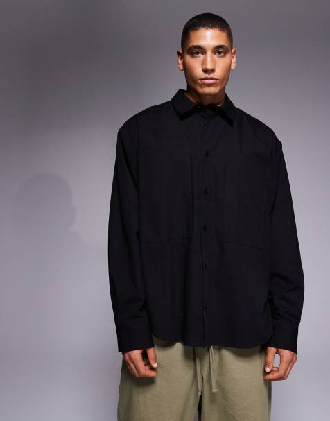 ASOS DESIGN oversized shirt with workwear pocket in black