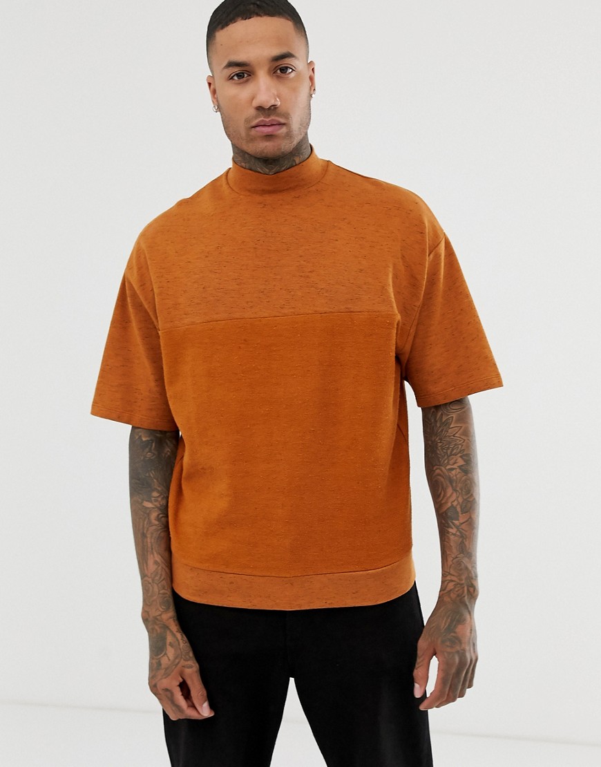 ASOS DESIGN oversized short sleeve crew neck with reverse panel in orange interest fabric