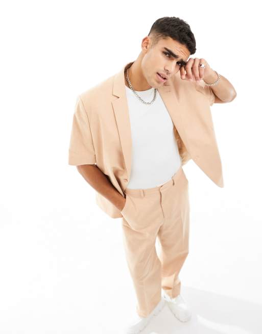 ASOS DESIGN oversized short sleeved suit jacket in slubby texture in peach