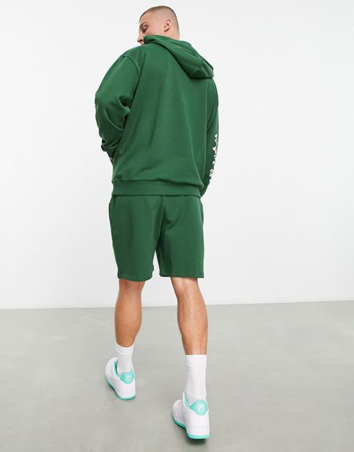 ASOS DESIGN extra long wide shorts in forest green
