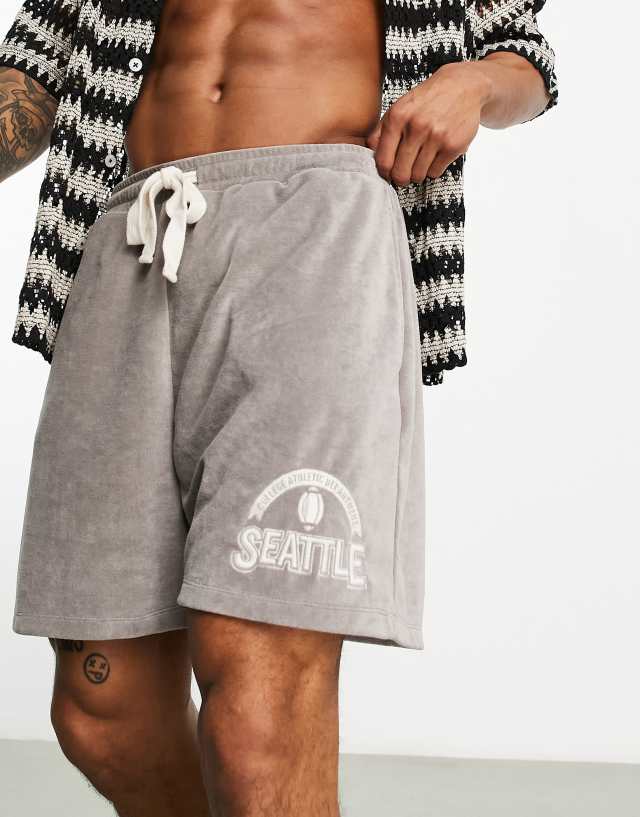 ASOS DESIGN oversized shorts in gray towelling with city embroidery