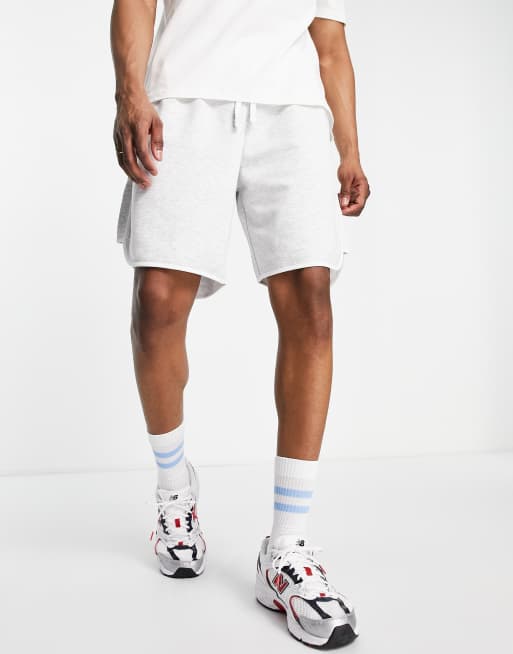 ASOS DESIGN oversized shorts with contrast hem in white marl